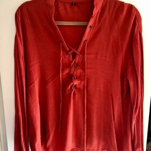 NWOT Burnt orange lace up blouse